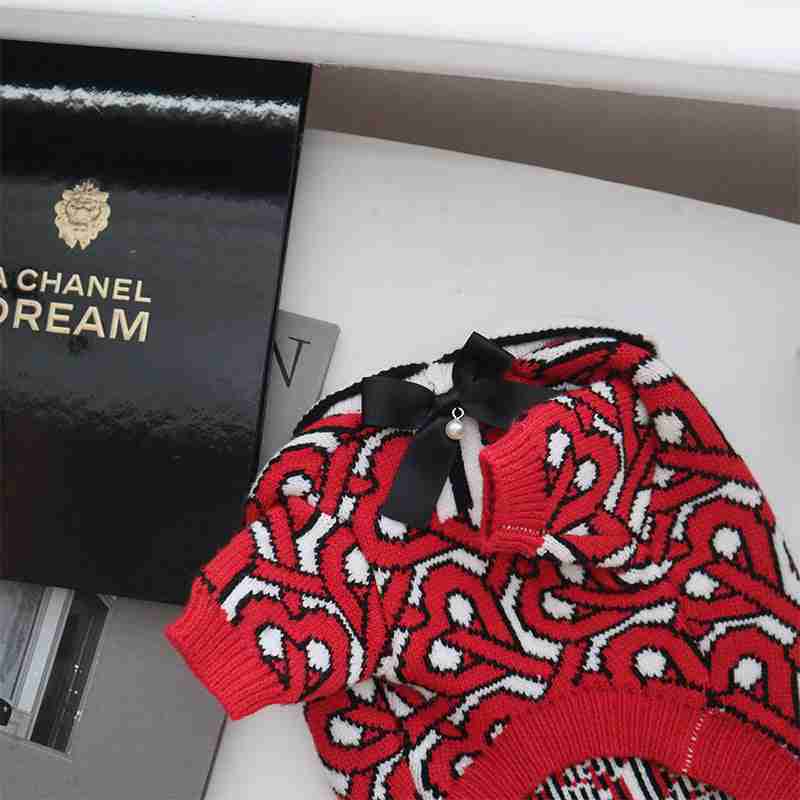 Red dog sweater with black bow