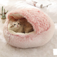 Pink plush pet bed with cats