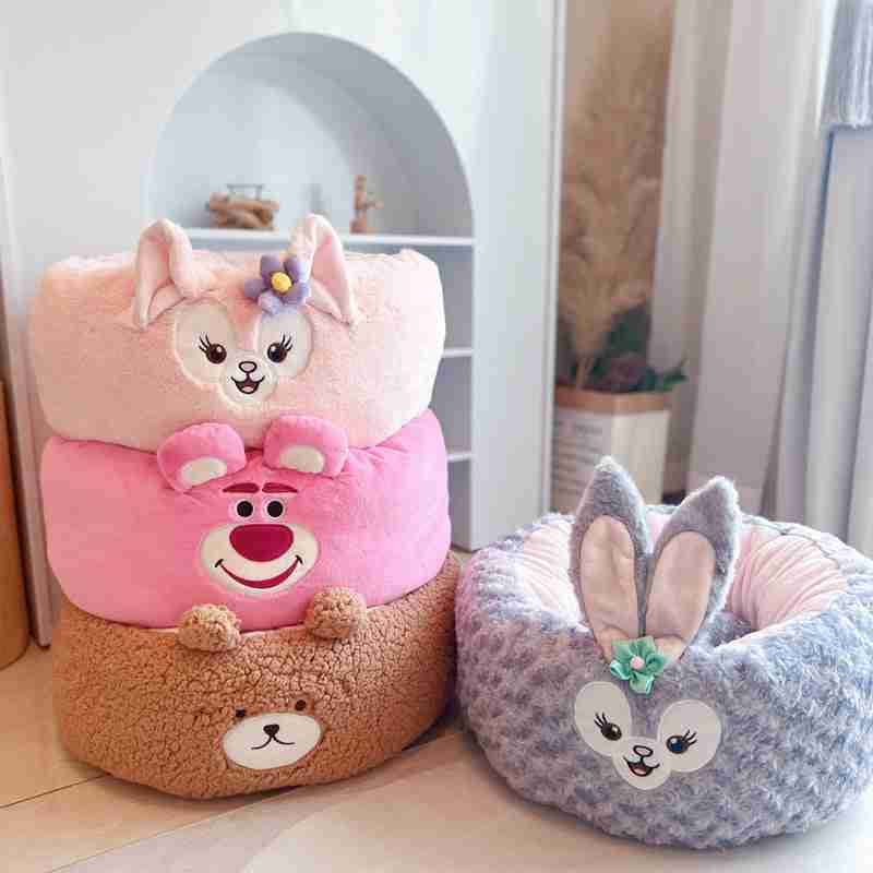 Stacked plush pet beds with animal designs