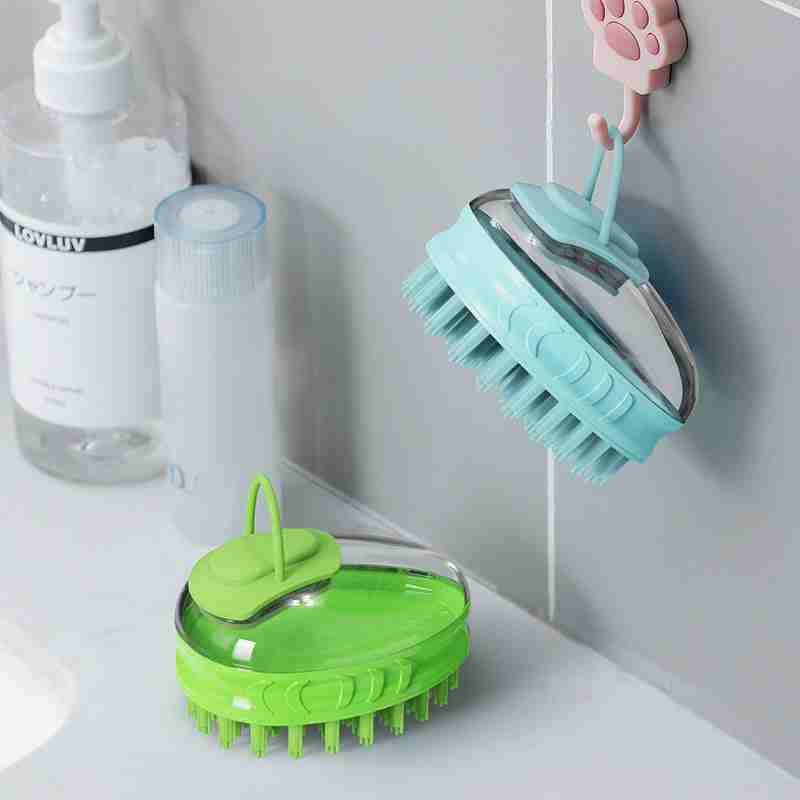 Pet grooming brush hanging on bathroom wall with cleaning supplies