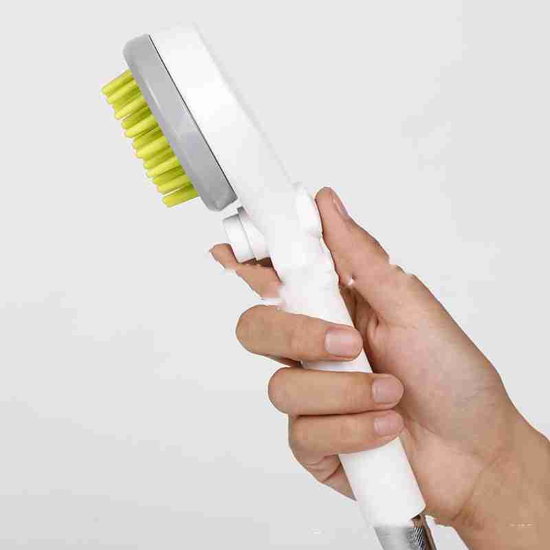 Pet grooming tool with water spray