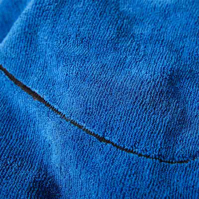 Blue pet towel fabric texture with black paw print