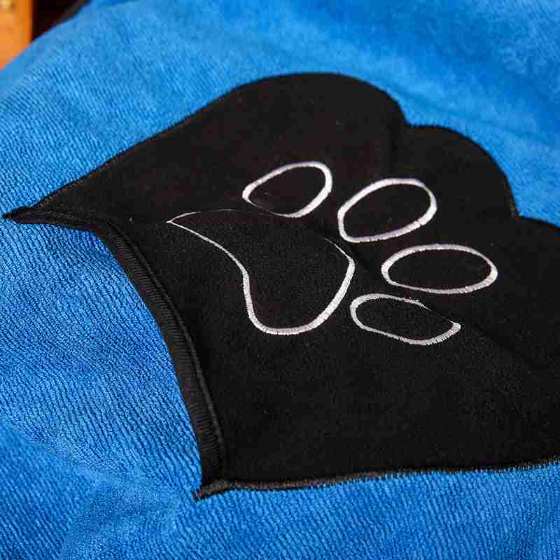 Close-up of paw print embroidery on pet towel