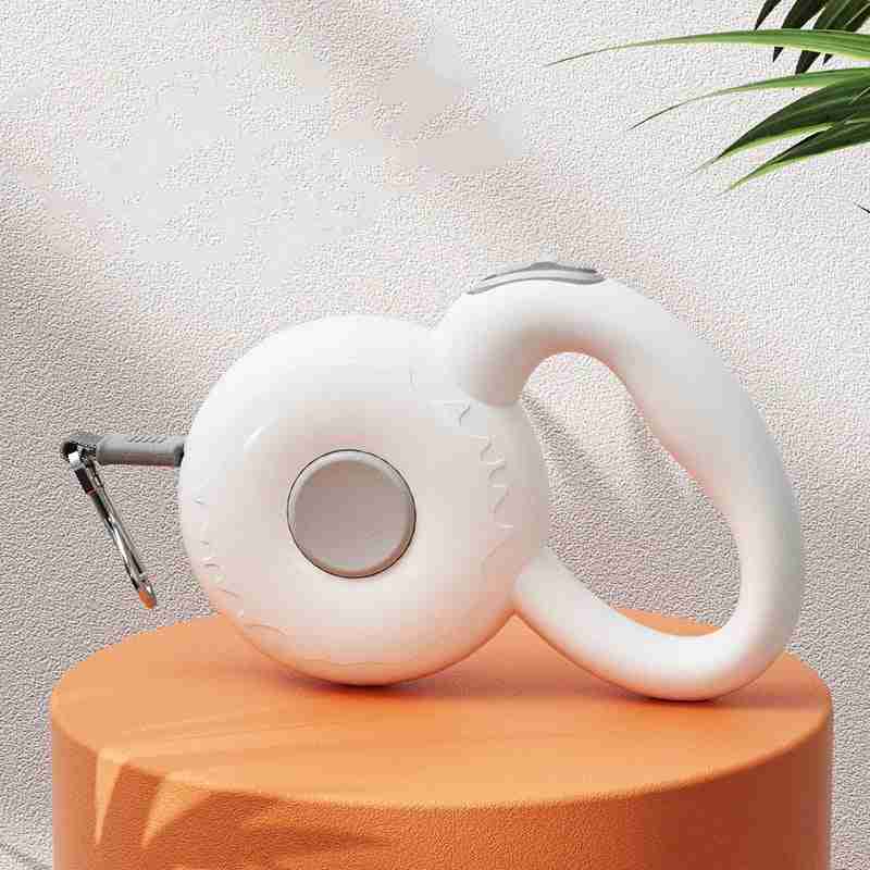 Retractable dog leash with reflective rope on orange pedestal