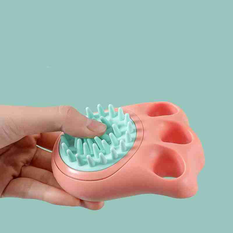 Ergonomic pet grooming brush with silicone spikes