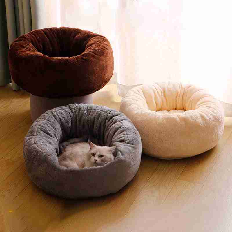 Gray plush pet bed with cat lying comfortably