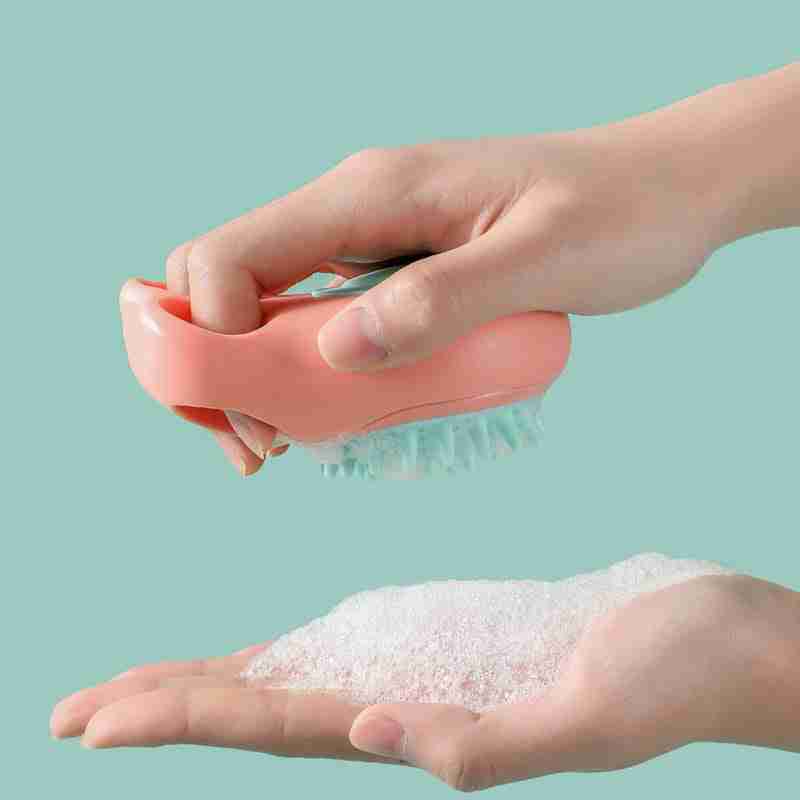 Pet bath brush in hand with foam