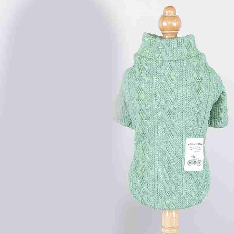 Green knitted pet sweater on display