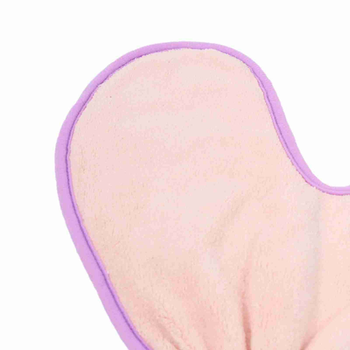 Close-up of pet grooming microfiber glove with pink trim